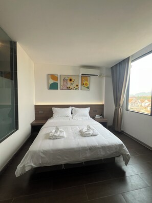 Basic Single Room | Premium bedding, down comforters, desk, blackout drapes - Xianglong Hotel (Luang Prabang)