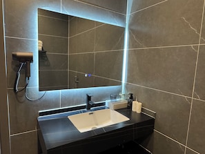 Shower, rainfall showerhead, designer toiletries, hair dryer