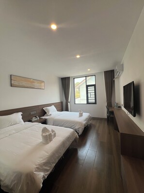 Basic Twin Room | Premium bedding, down comforters, desk, blackout drapes - Xianglong Hotel (Luang Prabang)