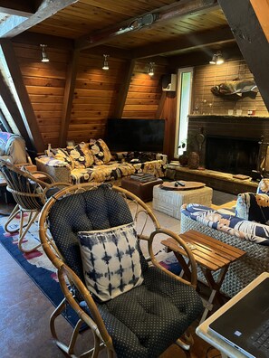 Smart TV, fireplace, table tennis, books