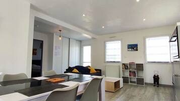 Apartment, Ground Floor | Living area | TV