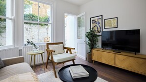 Apartment (2 Bedrooms) | Living area | 27-inch TV with cable channels - The Maida Hill Hideout - 2bdr Flat With Courtyard (London)