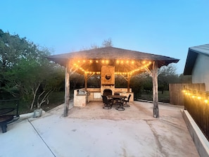 Outdoor dining - Large home with a pool sitting on the tee of the first tee box (Concan)