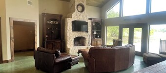 Large home with a pool sitting on the tee of the first tee box