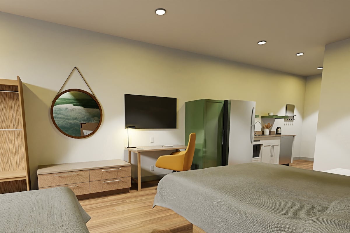 1 habitación, escritorio y espacio para trabajar con laptop