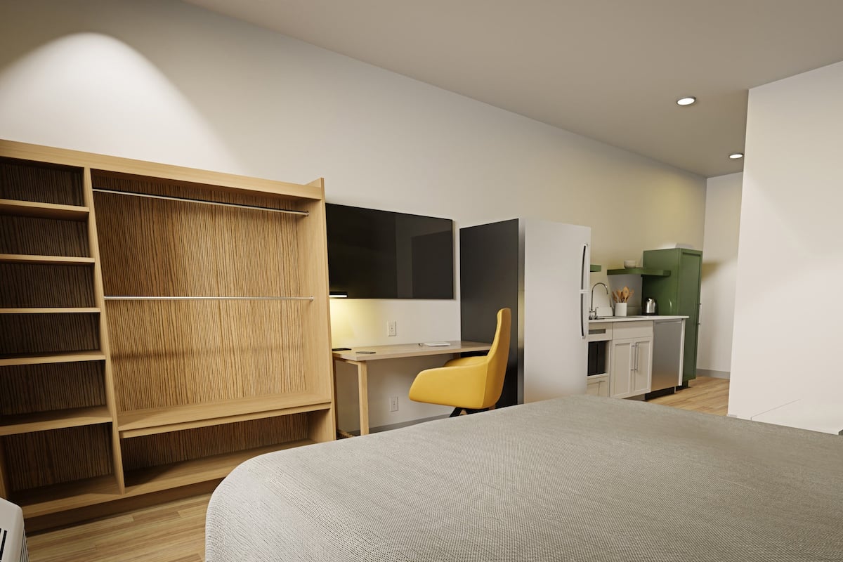 1 habitación, escritorio y espacio para trabajar con laptop