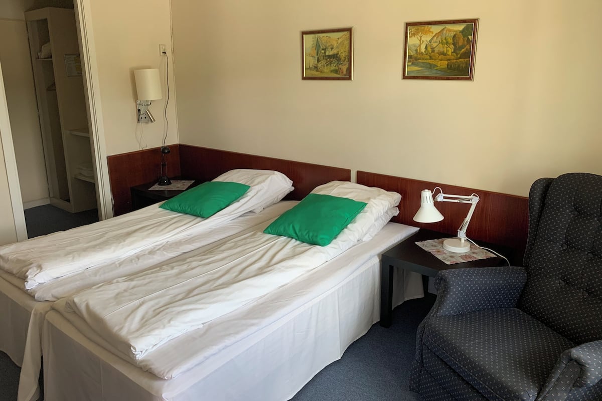 Desk, laptop workspace, free WiFi, bed sheets