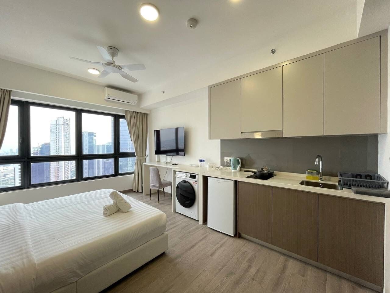 Individually furnished, desk, laptop workspace, iron/ironing board