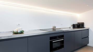 Comfort Apartment | Private kitchen | Fridge, stovetop, cookware/dishes/utensils