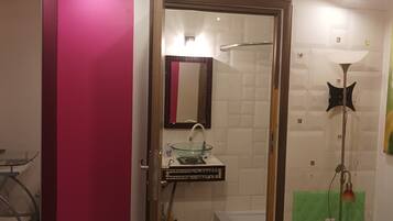 Shower, towels, soap, toilet paper