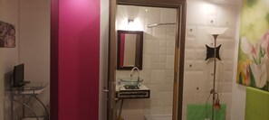 Shower, towels, soap, toilet paper