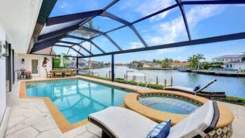House, Multiple Beds (Direct boating access waterfront home) | Pool | A heated pool