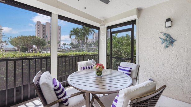 Outdoor dining - Rare Walkout Condo With Pool and Steps to Beach/food (Marco Island)
