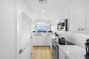 Condo, Multiple Beds (Beachfront condo with pools, gym and ) | Private kitchen - Beachfront Condo With Pools, gym and Charcoal Grills (Marco Island)