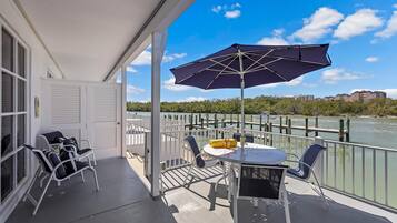 Condo, 1 King Bed (Coastal waterfront condo located in O) | Outdoor dining