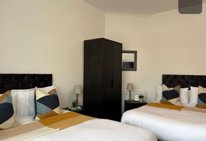 2 bedrooms, desk, iron/ironing board, travel cot