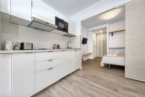 Fridge, microwave, coffee/tea maker, electric kettle