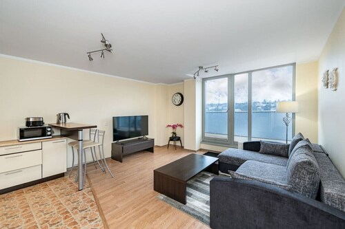 Lovely city panorama ap by Polo Apartments