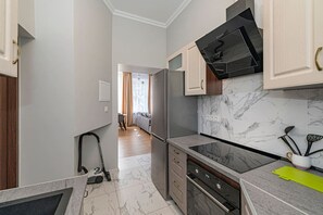 Fridge, microwave, oven, stovetop - City center ap w parking by Polo Apartments (Kaunas)