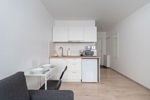 Fridge, microwave, stovetop, coffee/tea maker