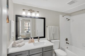 Hair dryer, towels, soap, toilet paper