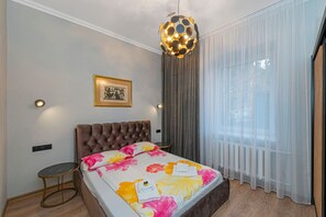 1 dormitorio, tabla de planchar con plancha, wifi gratis y ropa de cama