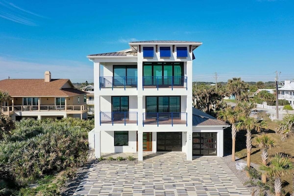 Brand new construction - beachfront luxury at it's finest!