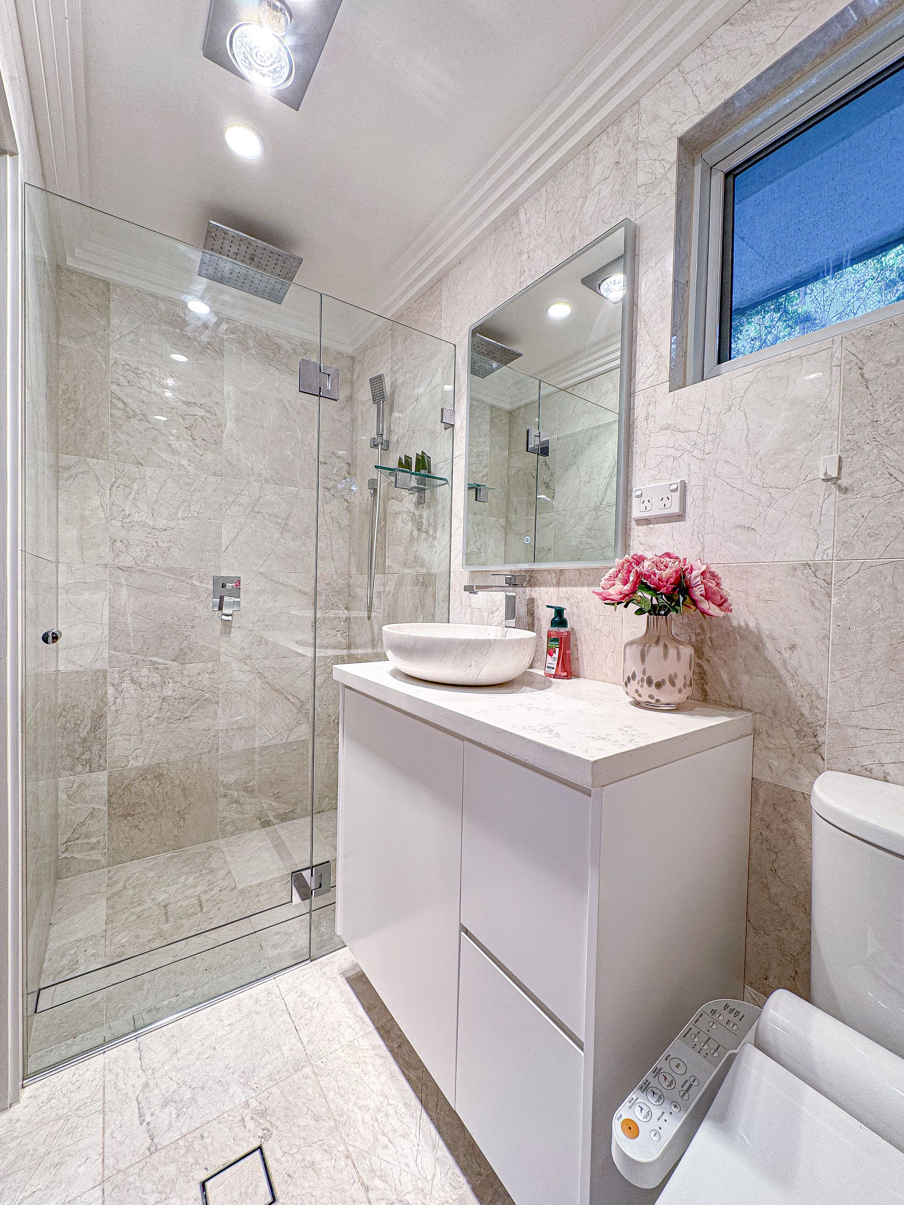 Hair dryer, bidet, towels, soap