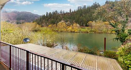 Charming home on the Siuslaw River with private dock, fire pit, WiFi, & W/D