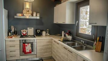 Réfrigérateur, four, plaque de cuisson, lave-vaisselle