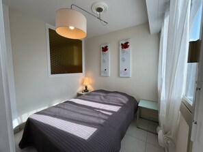 1 chambre, fer et planche Ă repasser, Wi-Fi gratuit, draps fournis