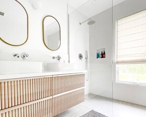 Shower, eco-friendly toiletries, towels, soap