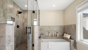 Shower, towels, soap, toilet paper