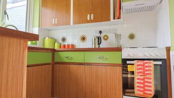 Fridge, microwave, cookware/dishes/utensils