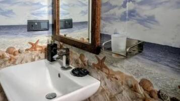 Shower, towels, toilet paper