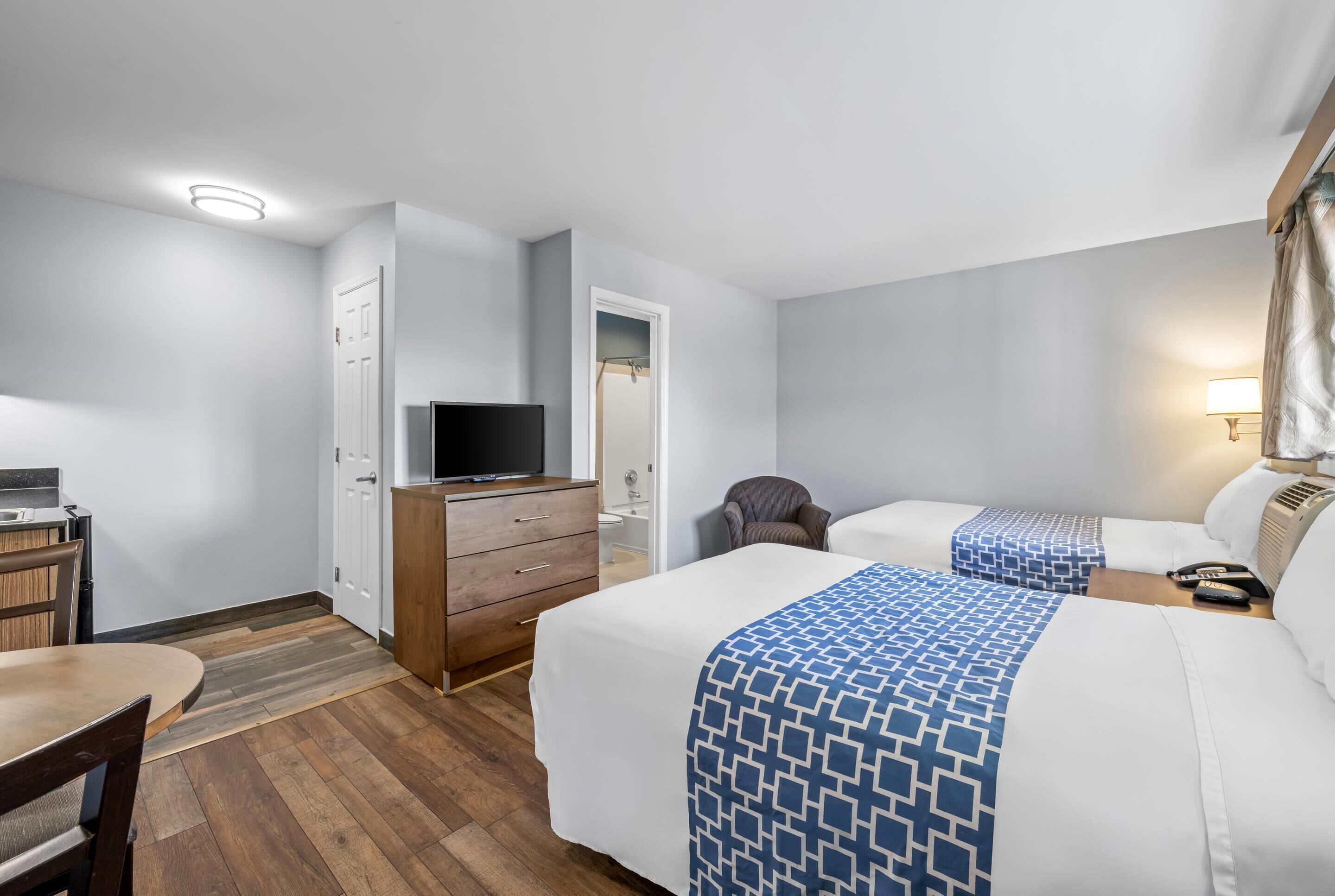 Standard Room, 2 Double Beds, Non Smoking | Iron/ironing board, free cribs/infant beds, rollaway beds, free WiFi