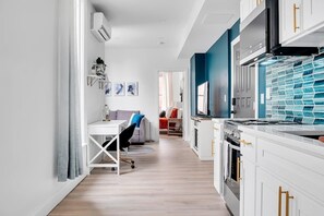 Fridge, microwave, oven, stovetop - Urban Nest #2 | Bright 1BD Steps From Downtown (Schenectady)