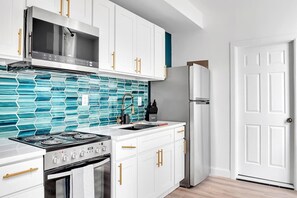 Fridge, microwave, oven, stovetop - Urban Nest #2 | Bright 1BD Steps From Downtown (Schenectady)