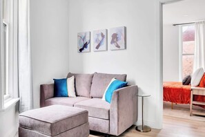 TV, offices - Urban Nest #2 | Bright 1BD Steps From Downtown (Schenectady)