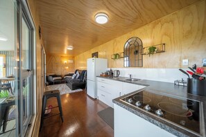 Fridge, microwave, toaster, cookware/dishes/utensils