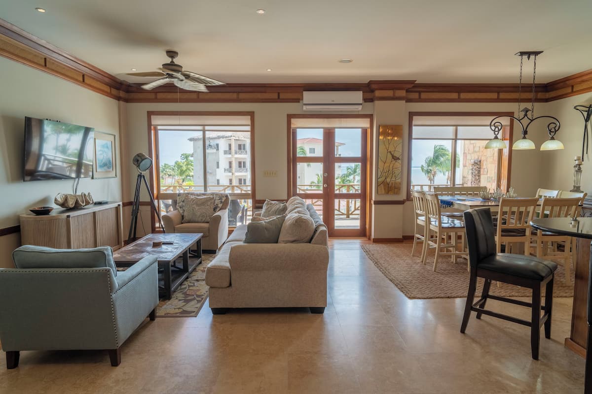 Family Condo, 2 Bedrooms, Air conditioning, Beachside | Premium bedding, in-room safe, laptop workspace, blackout drapes