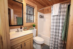 Jetted tub, hair dryer, towels, soap