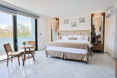 Suite, City View | 1 bedroom, in-room safe, blackout drapes, free WiFi