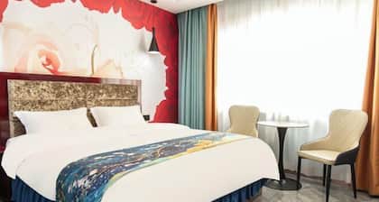 Kuqa Xinyu Hotel (Guiz Plaza)