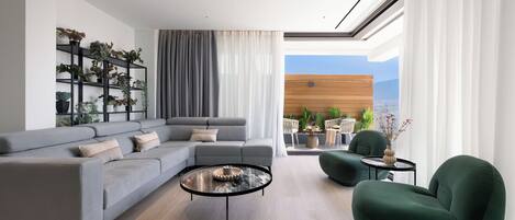 Cobertura panorâmica, vista parcial para o mar | Área de estar