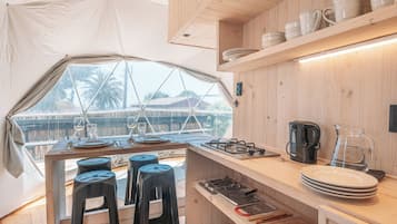 Mini-fridge, stovetop, cookware/dishes/utensils