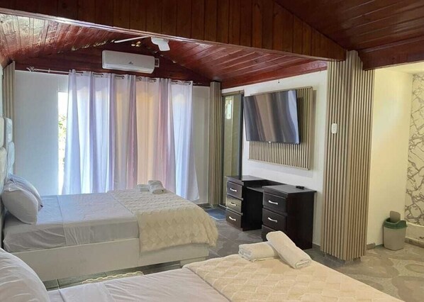 1 bedroom, WiFi, bed sheets - Dashari room C2-1 Close to the boardwalk and 10 minutes from the beaches. (Barahona)