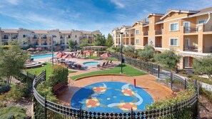 A resort with multiple buildings, a central pool area with sun loungers, and a decorative pool edge. - Big Fun, Boutique Feel – Your Napa Getaway- Wyndham Vino Bello- Studio (Napa)