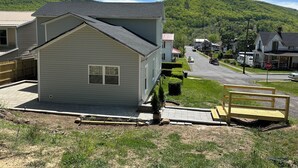 A residential area with houses, a road, and a stop sign. - Newly renovated 3 bed 2 bath house in Clifton Forge, Va (Clifton Forge)