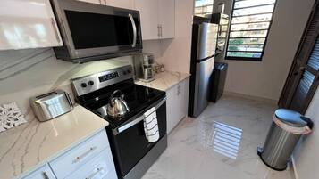 Fridge, microwave, oven, stovetop